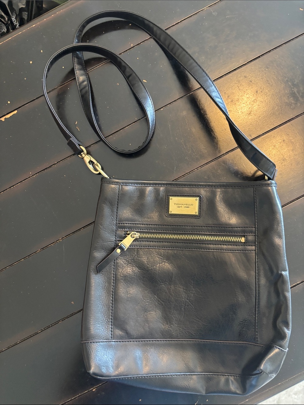 Tignanello leather black cross body 12 inches long never used